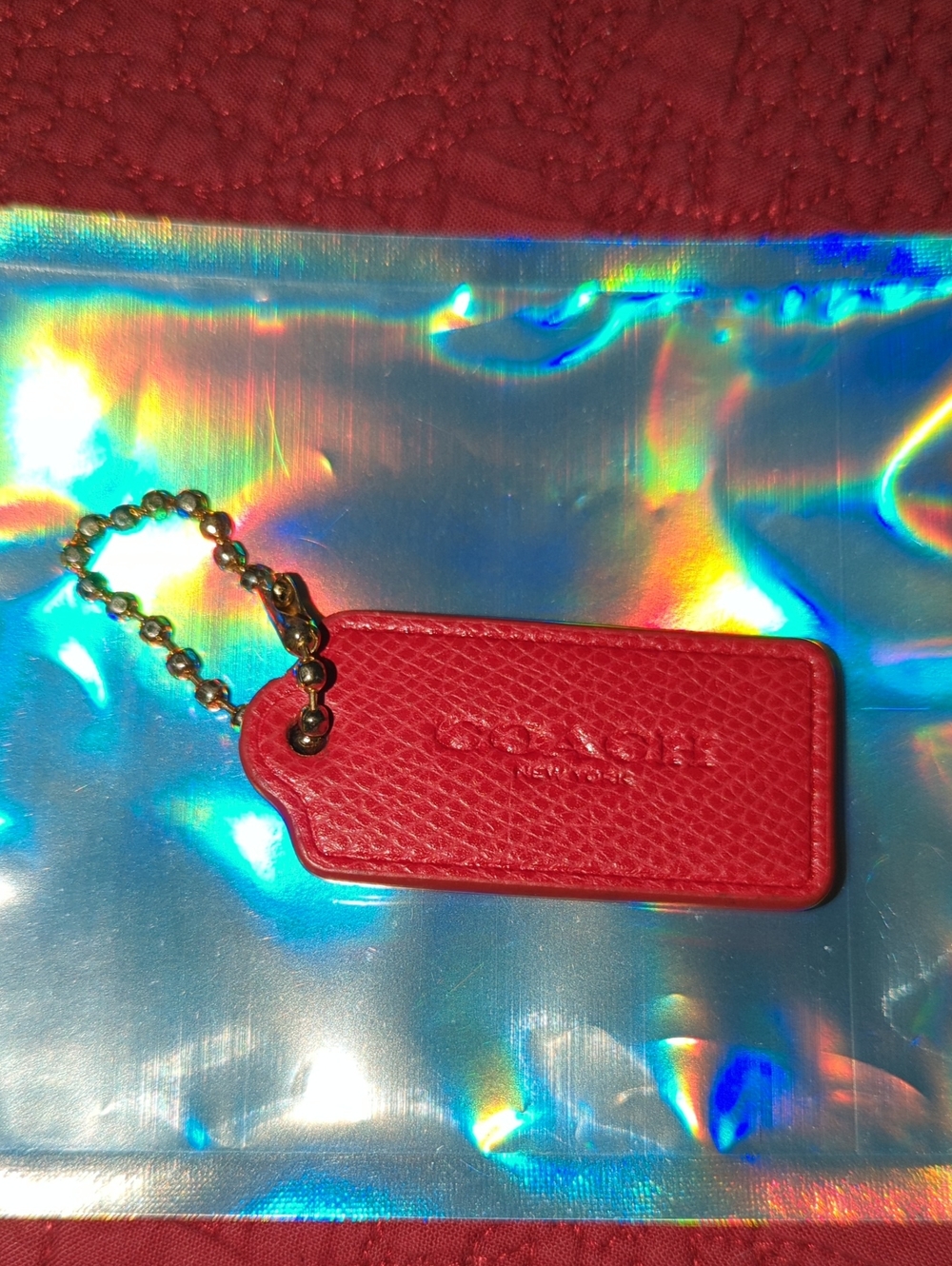 (0034) Coach Dark Red Pebbled Leather Tag with Gold Ball Chain